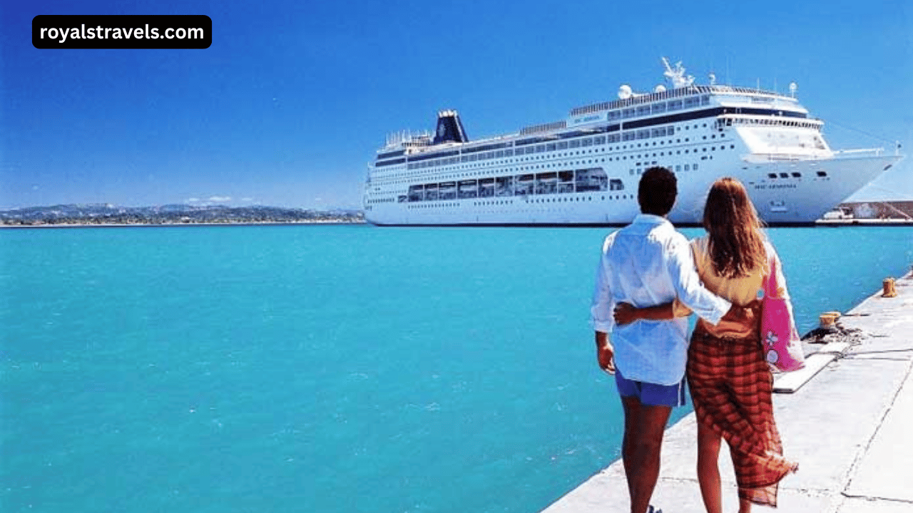 Luxury cruise ship sailing through turquoise waters with sunset in the background