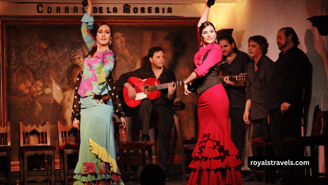 Flamenco dancer in traditional red dress performing in Spain