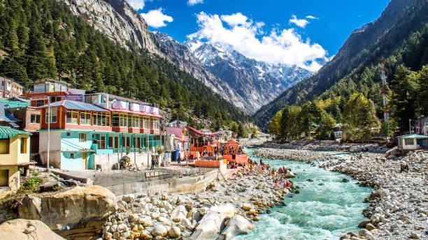 Bhagirathi River flowing through Gangotri town surrounded by Himalayan mountains