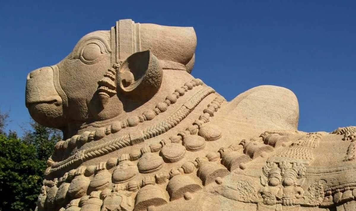 Massive monolithic Nandi statue at Lepakshi Temple, carved from a single granite stone and facing the Veerabhadra Swamy Temple.