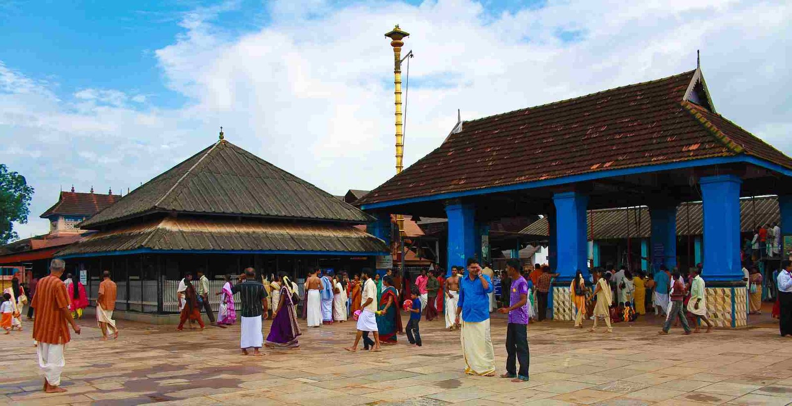 Devotees visiting Chottanikkara Bhagavathy Temple in Kerala during daytime prayers.