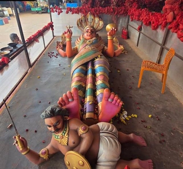 Large reclining goddess statue inside Kateramma Temple Kambalipura near Hoskote Karnataka.
