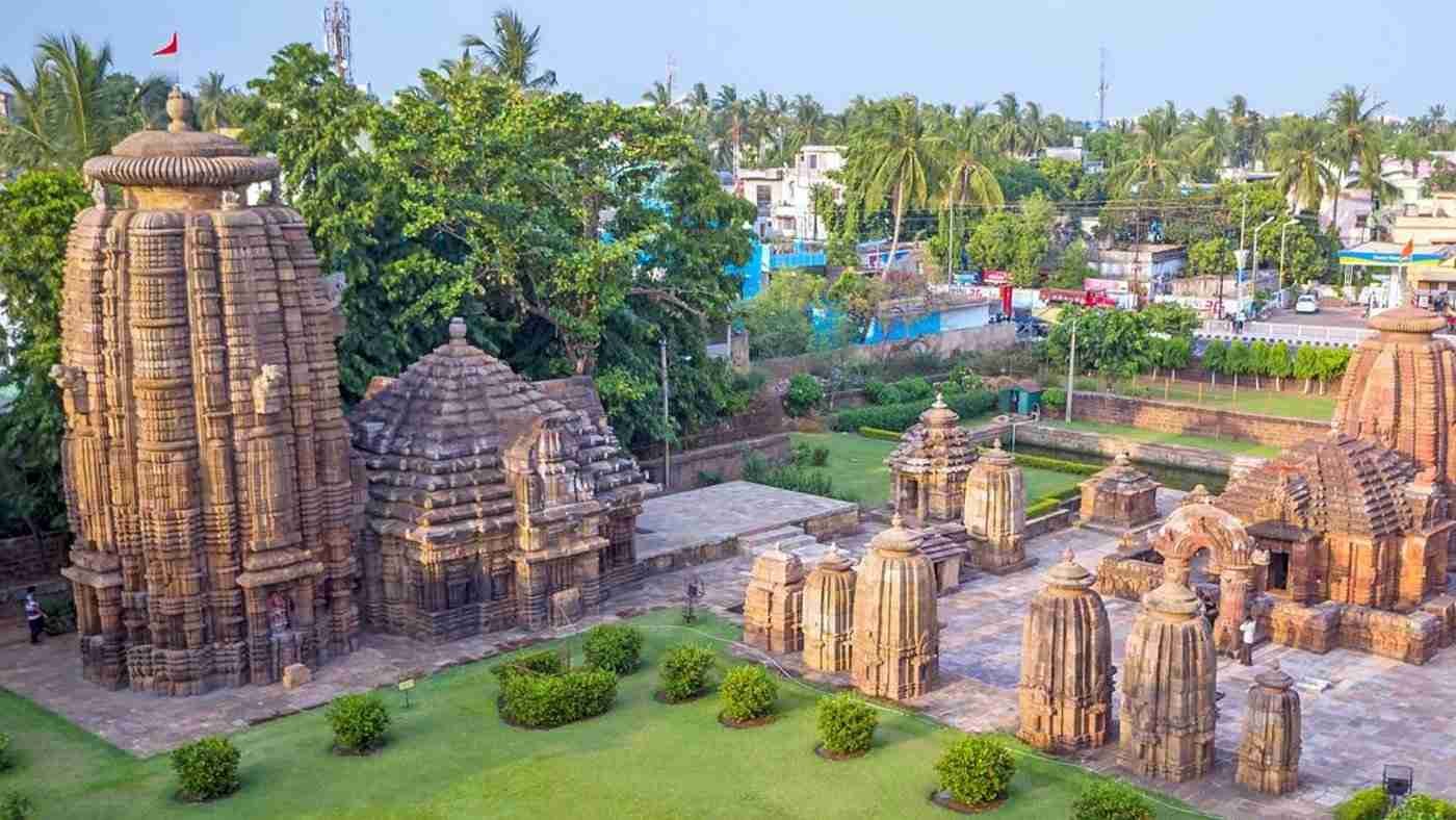 Aerial view of Mukteswara Temple complex in Bhubaneswar surrounded by greenery and ancient shrines.