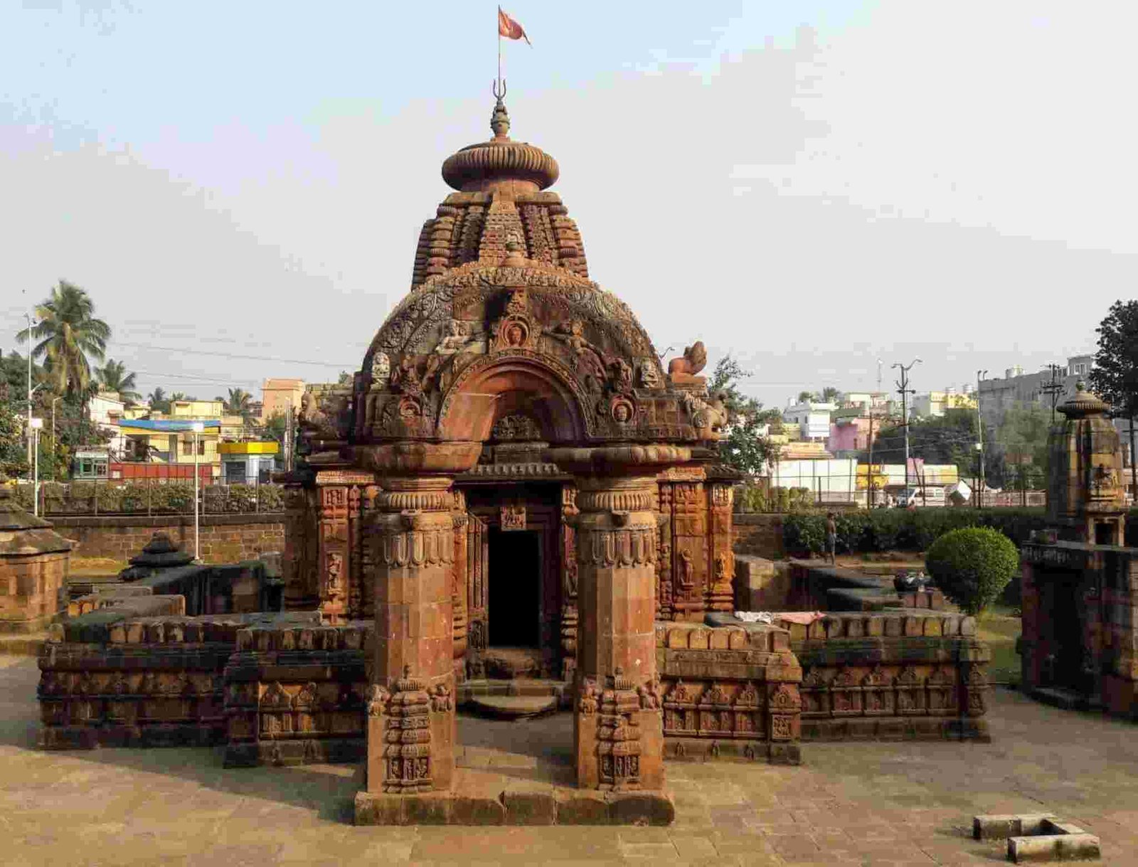 Historic Mukteswara Temple in Bhubaneswar featuring detailed stone carvings and ancient Odisha architecture.