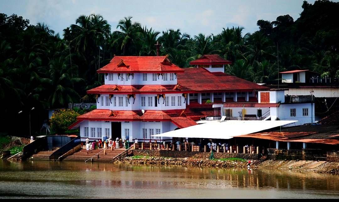 Parassinikadavu Muthappan Temple located on the banks of the Valapattanam River in Kannur, Kerala.