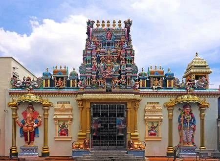 Front view of Samayapuram Mariamman Temple with colorful Dravidian-style gopuram in Tamil Nadu