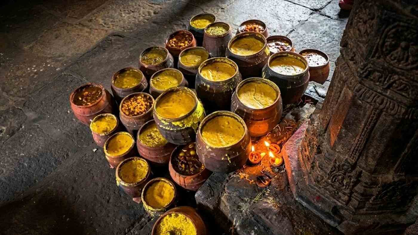 Traditional Mahaprasad served in earthen pots at Ananta Vasudeva Temple.