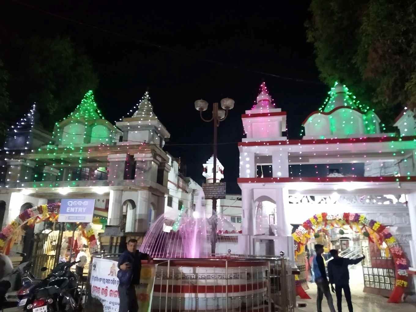 Maa Samaleswari Temple illuminated with colorful lights during a festival celebration in Sambalpur, Odisha.