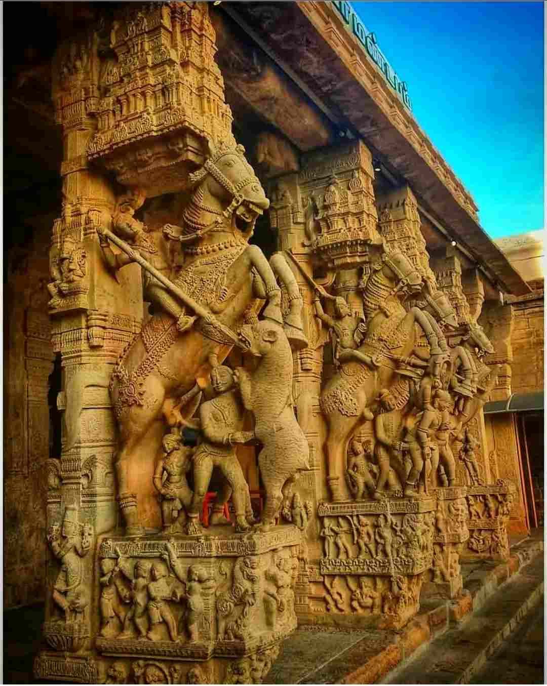 Detailed stone sculptures and carved pillars at Sri Ranganatha Swamy Temple, Srirangam.