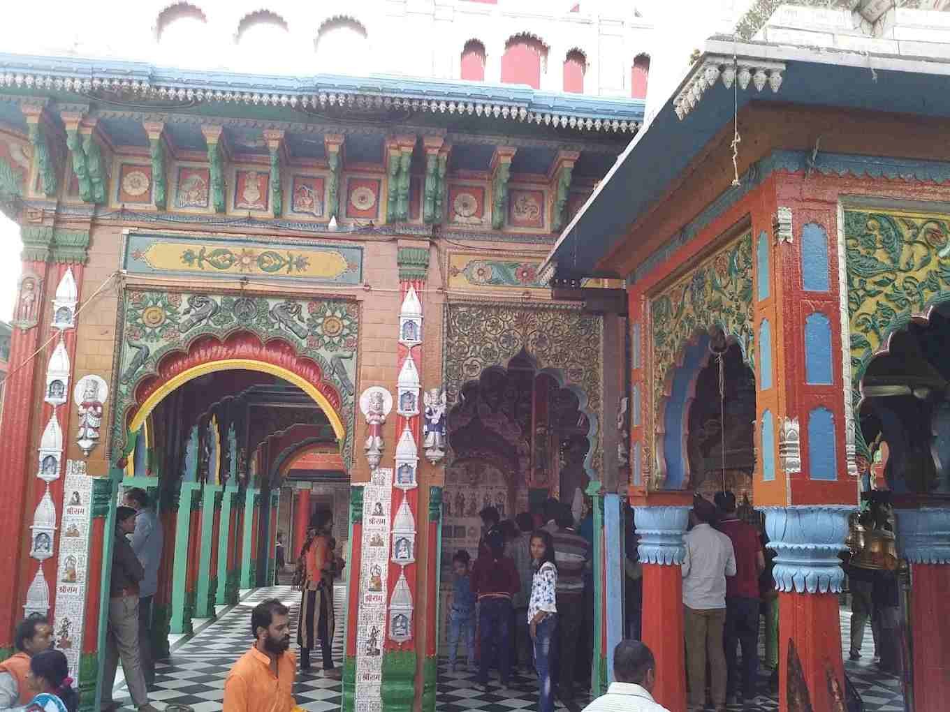 Main entrance of Hanuman Garhi Temple in Ayodhya with devotees visiting for darshan.